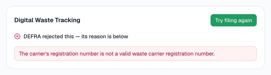 The Digital Waste Tracking card after DEFRA rejected a filing: “DEFRA rejected this — its reason is below”, the carrier's registration number is not a valid waste carrier registration number, and a Try filing again button.