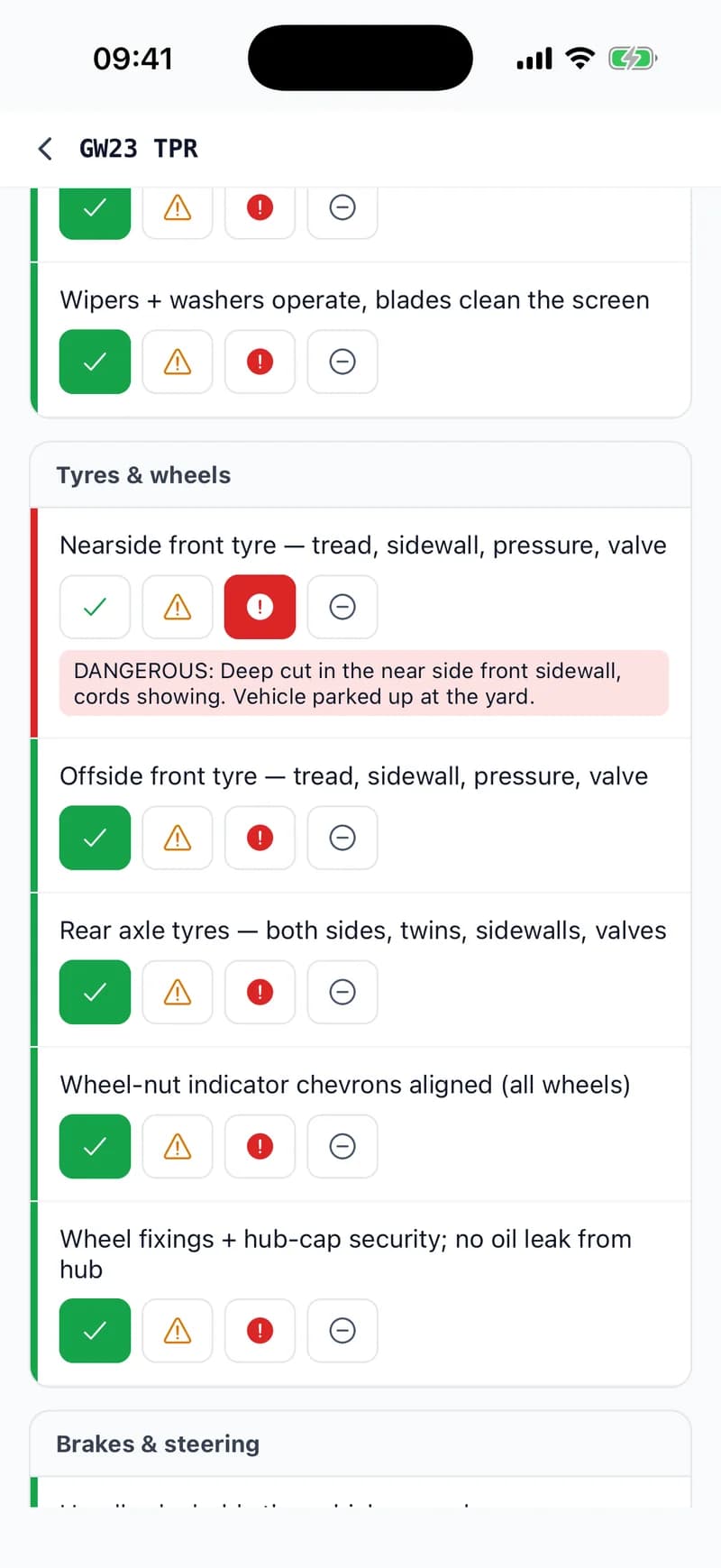 A walkaround check for GW23 TPR in the WTNcloud app, open at Tyres & wheels: the nearside front tyre is marked dangerous with the note “Deep cut in the near side front sidewall, cords showing”, and the other tyre and wheel lines are ticked OK.