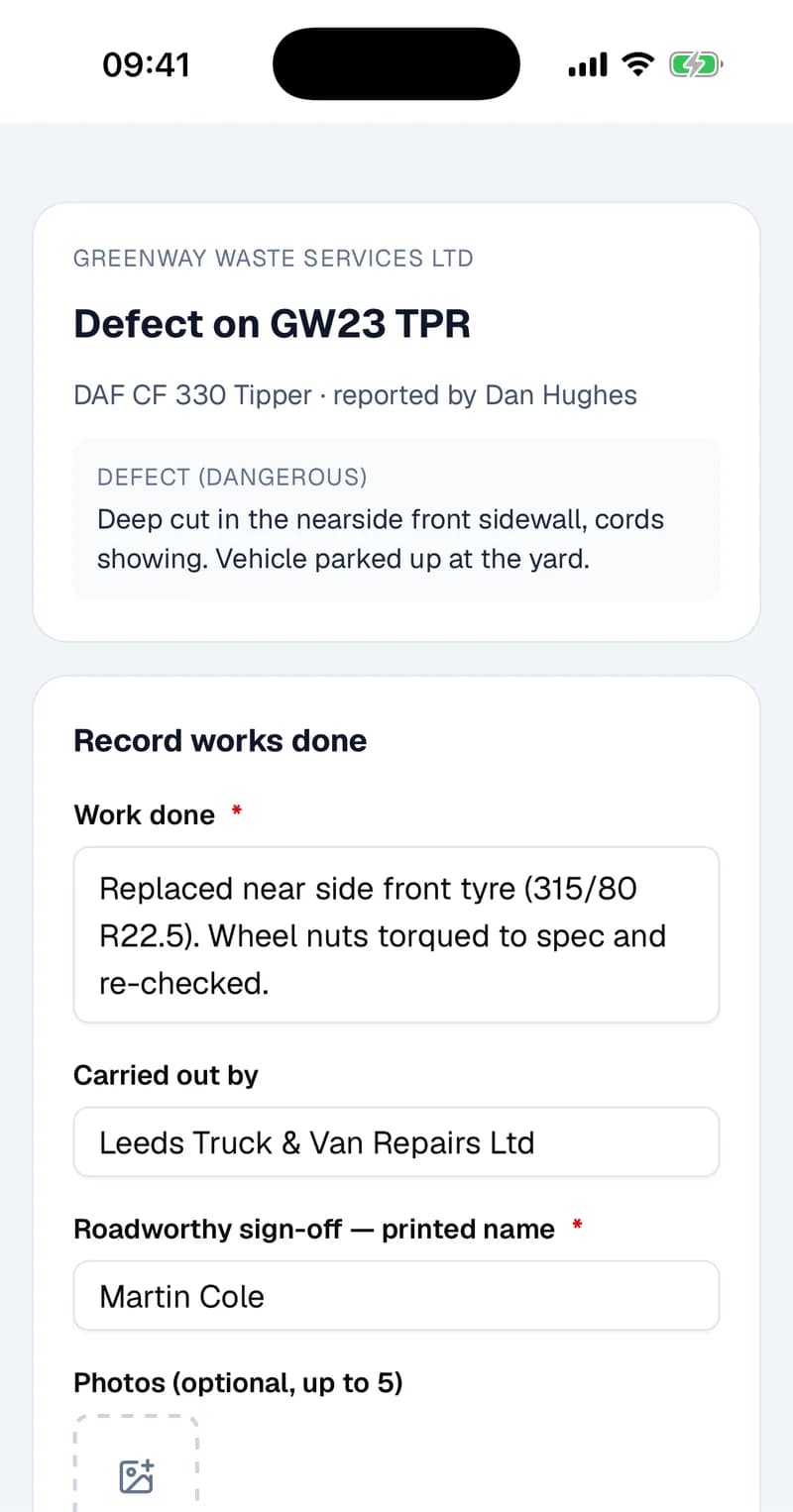 The fitter's form in Safari on an iPhone: Greenway Waste Services Ltd, Defect on GW23 TPR reported by Dan Hughes with the dangerous tyre description, and Record works done filled in with the replacement tyre, Leeds Truck & Van Repairs Ltd, and Martin Cole as the person signing off.